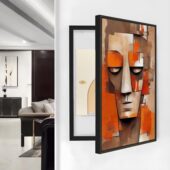 لوحة كانفس بألوان دافئة وتصميم تجريدي، إطار أسود، مثالية لتغطية طبلون الكهرباء.