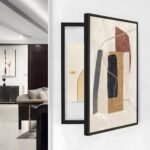 لوحة كانفس هندسية متعددة الألوان، إطار أسود، تصميم عصري يناسب تغطية طبلون الكهرباء.