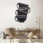 لوحة أكريلك سوداء بتصميم فناجين قهوة متراكبة، تضيف لمسة عصرية لديكور المنزل.