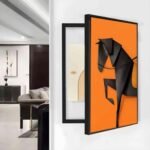 لوحة كانفس ثلاثية الأبعاد بتصميم حصان أسود على خلفية برتقالية، إطار أسود أنيق.