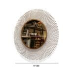مرآة جدارية دائرية بتصميم عصري، إطار معدني ذهبي، قطر 97 سم، وقطر المرآة الداخلية 55 سم.