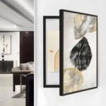 لوحة كانفس بألوان محايدة وتصميم هندسي، إطار أسود، مثالية لتغطية طبلون الكهرباء.