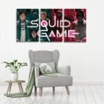 ثلاث لوحات قماشية ملونة بتصميم مسلسل SQUID GAME، تعرض شخصيات وعناصر مميزة من العمل.
