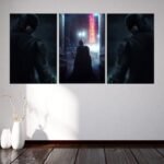 ثلاث لوحات قماشية بتصميم مستوحى من فيلم باتمان، بألوان داكنة وتفاصيل فنية مذهلة.