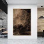 لوحة قماشية بتصميم مودرن بألوان دافئة مع برواز مجوف، تعكس جمال السحب والغيوم.